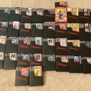 Huge lot of NES games.   Some really good ones Instruction books, maps, cases